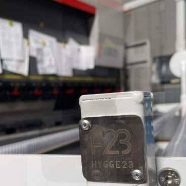 Hygge23 metal nameplate on industrial equipment